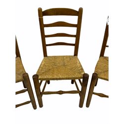 Two 19th century elm ladder back chairs and a 19th century elm spindle back chair