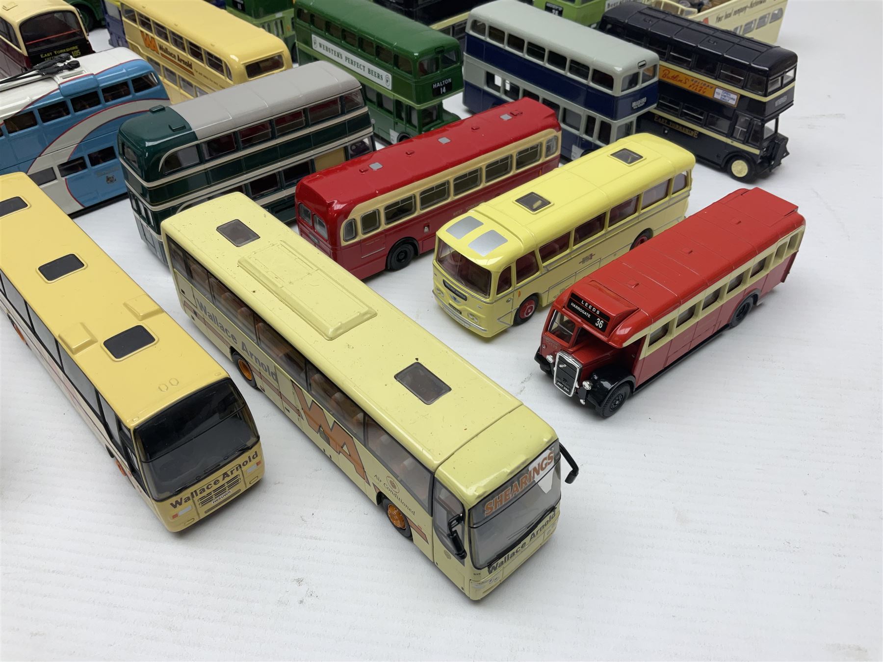 Thirty-one modern die-cast models of buses, coaches and trams by Corgi, EFE, Solido etc; predominantly unboxed but one in box