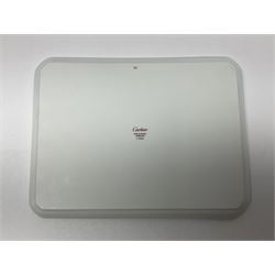 Limoges for Cartier, ceramic trinket dish, of rectangular form with rounded corners, decorated to centre with leopard upon a blue ball, with blue and gilt rim, with printed mark beneath, in original box, H15.5cm, W21cm