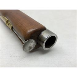 Reproduction non-firing flintlock pistol with brass skull crusher butt, the lock-plate inscribed 'Tower' and 'GR' L40cm; Sabre Japan Original Bowie Knife in sheath; and Indian embossed nickel two-piece walking cane (3)