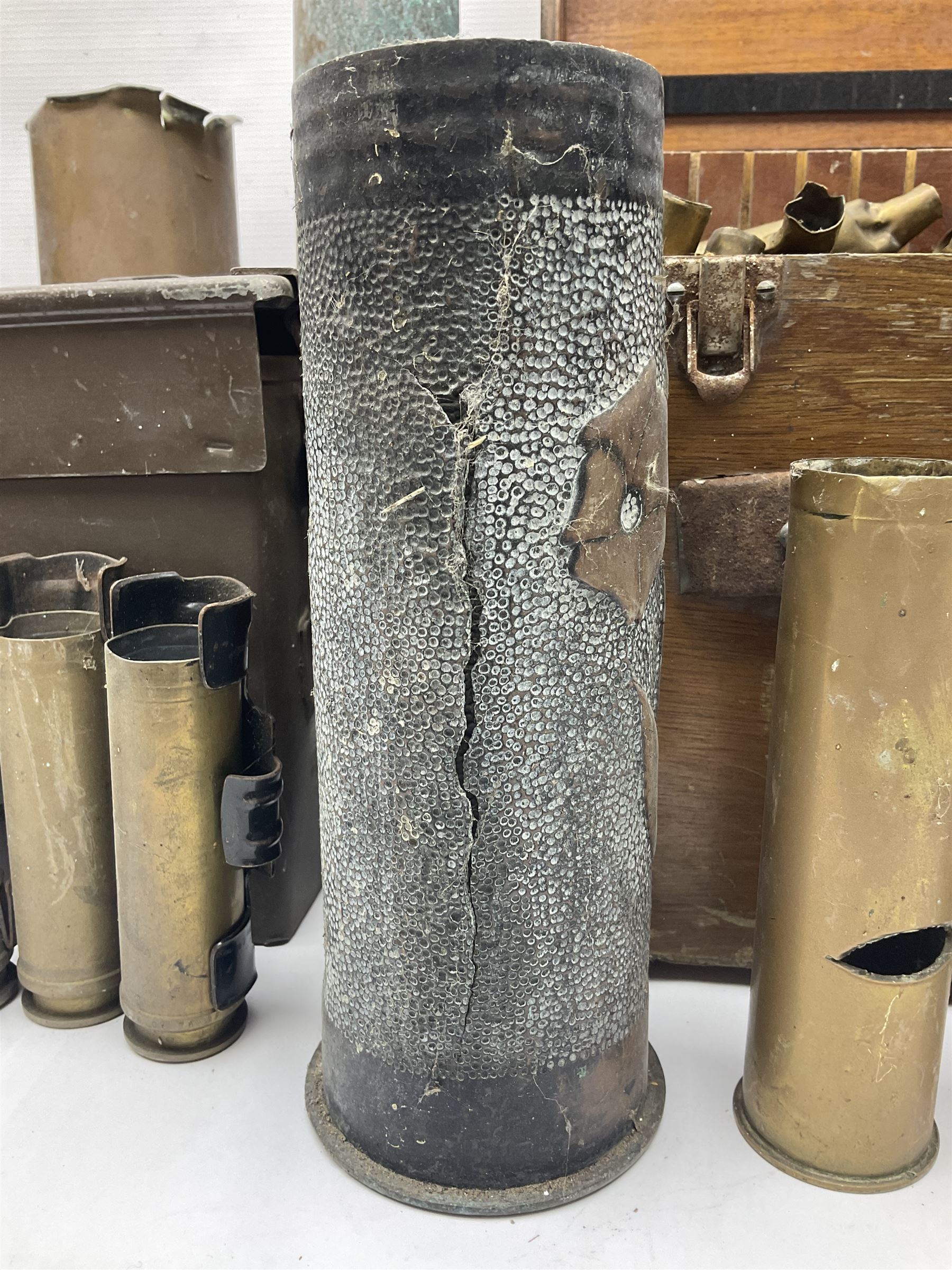 Large collection of shell and bullet casings, including a trench art example, together with a metal cartage case and wooden case