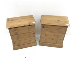 Pair solid pine bedside lamp chests, three drawers, plinth base, W51cm, H61cm, D30cm