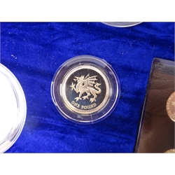  'The United Kingdom Millennium Silver Collection', complete with all thirteen coins, in original blue case with certificate, No. 01849  
