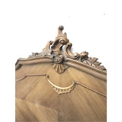 French walnut 4’ 6” double bedstead, the headboard with carved leaf and shell cartouche above segmented veneer panels, shaped foot board with floral carved mount, acanthus cabriole feet, with box base