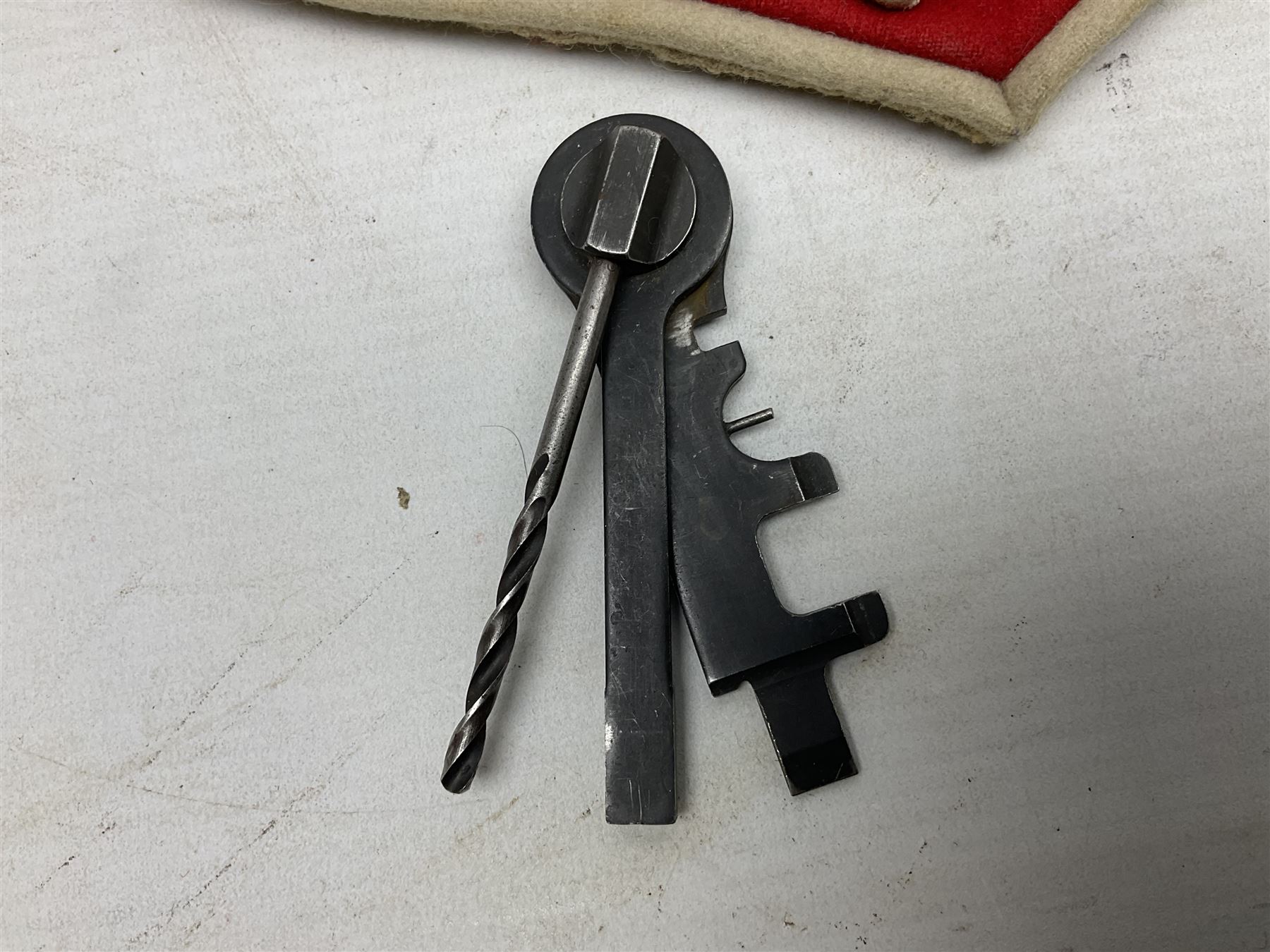 Miscellaneous militaria including two Royal Artillery and one Royal Horse Artillery stable belts; Northamptonshire Regiment trench art brass shell case lighter; unused Matchless Fire-Set; pocket knives and multi-tool; lanyards; oak shield with York & Lancaster crest etc