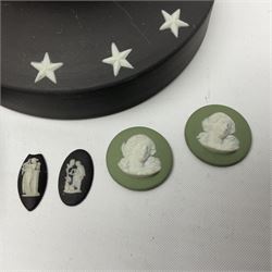 Collection of Wedgwood Jasperware, to include black Eisenhower Bust, two black basalt paperweights, one depicting an eagle and one depicting Julius Caesar, a blue Zodiac plate, Man on the Moon commemorative plate, American Independence Bicentennial plate and Royal commemorative ware, etc, all with impressed marks beneath, some with boxes