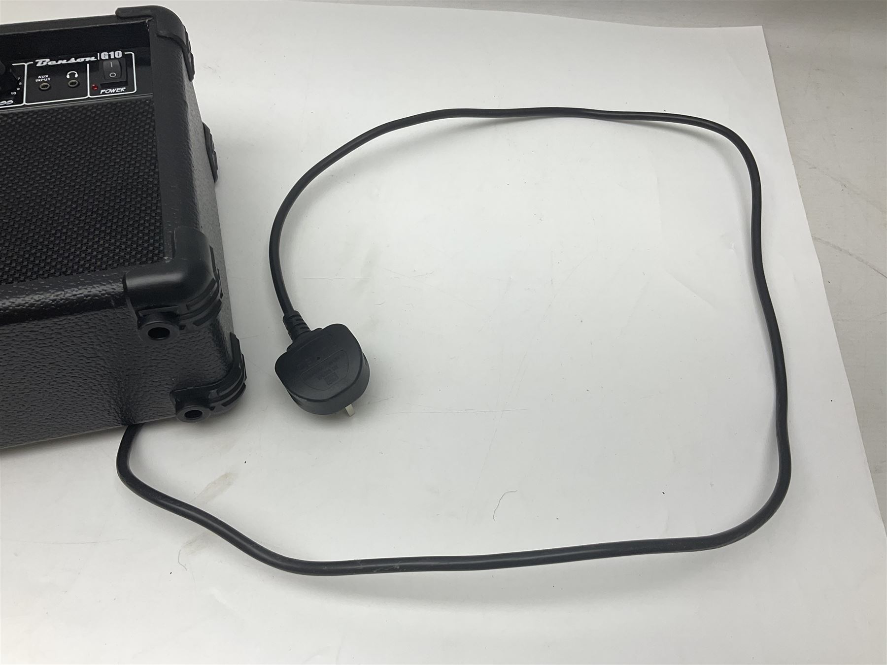 Aria Les Paul style electric guitar, no.037704CH L102cm; with amplifier, soft carrying case and stand; together with various guitar songbooks etc