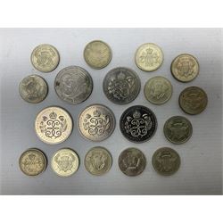 Five Queen Elizabeth II five pound coins and thirteen old style two pound coin