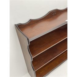 Rossmore Furniture - mahogany bookcase fitted with four shelves, shaped end supports