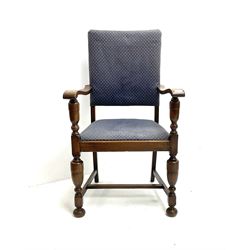 Oak framed armchair with upholstered seat and back, turned supports and pad feet