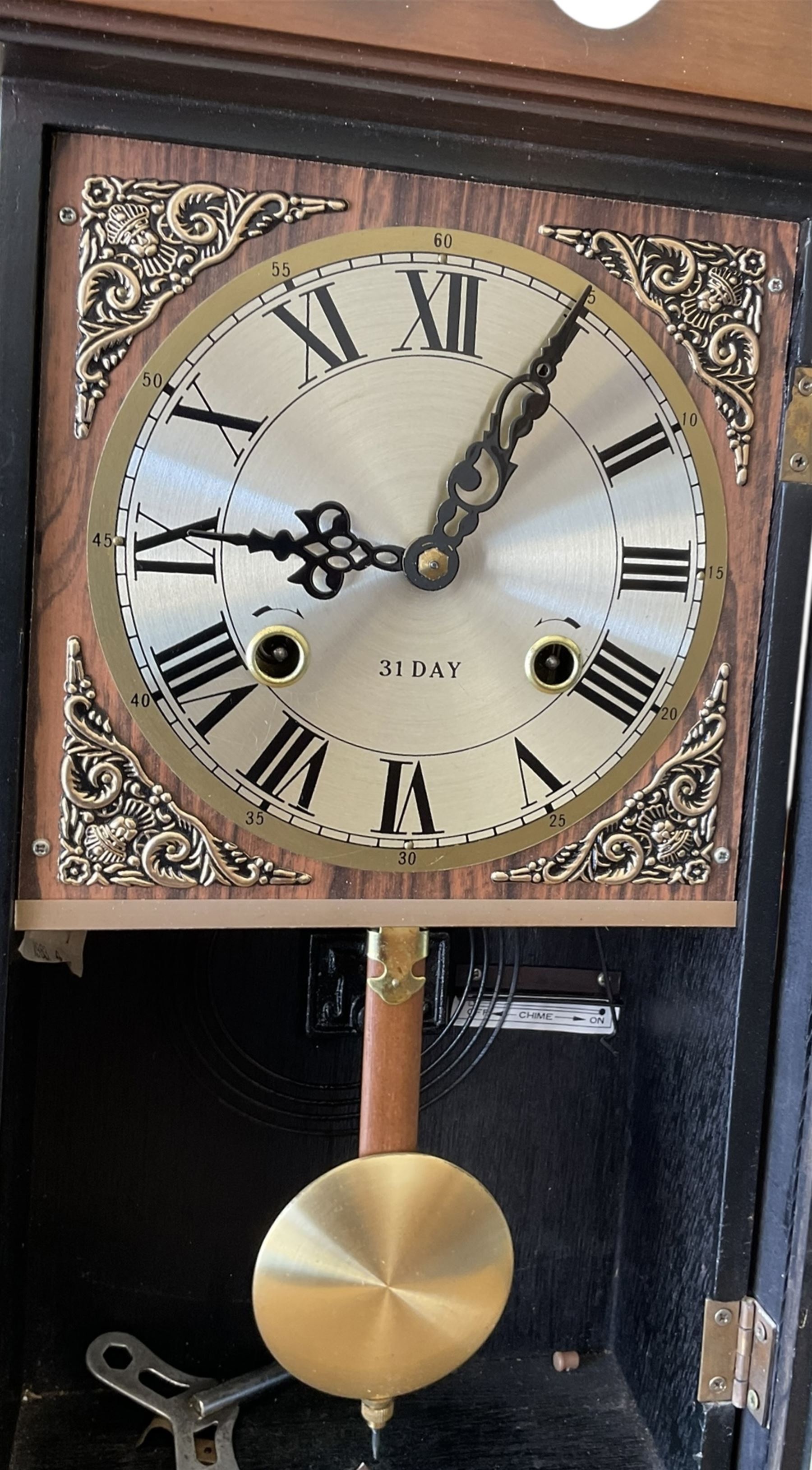 20th century- 31-day spring driven mantle/wall clock striking the hours on a gong.