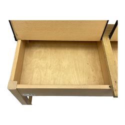 Mid-20th century beechwood school desk, rectangular lift-top desk with storage compartment, supported by square legs with cross stretchers; two matching beech chairs (3)