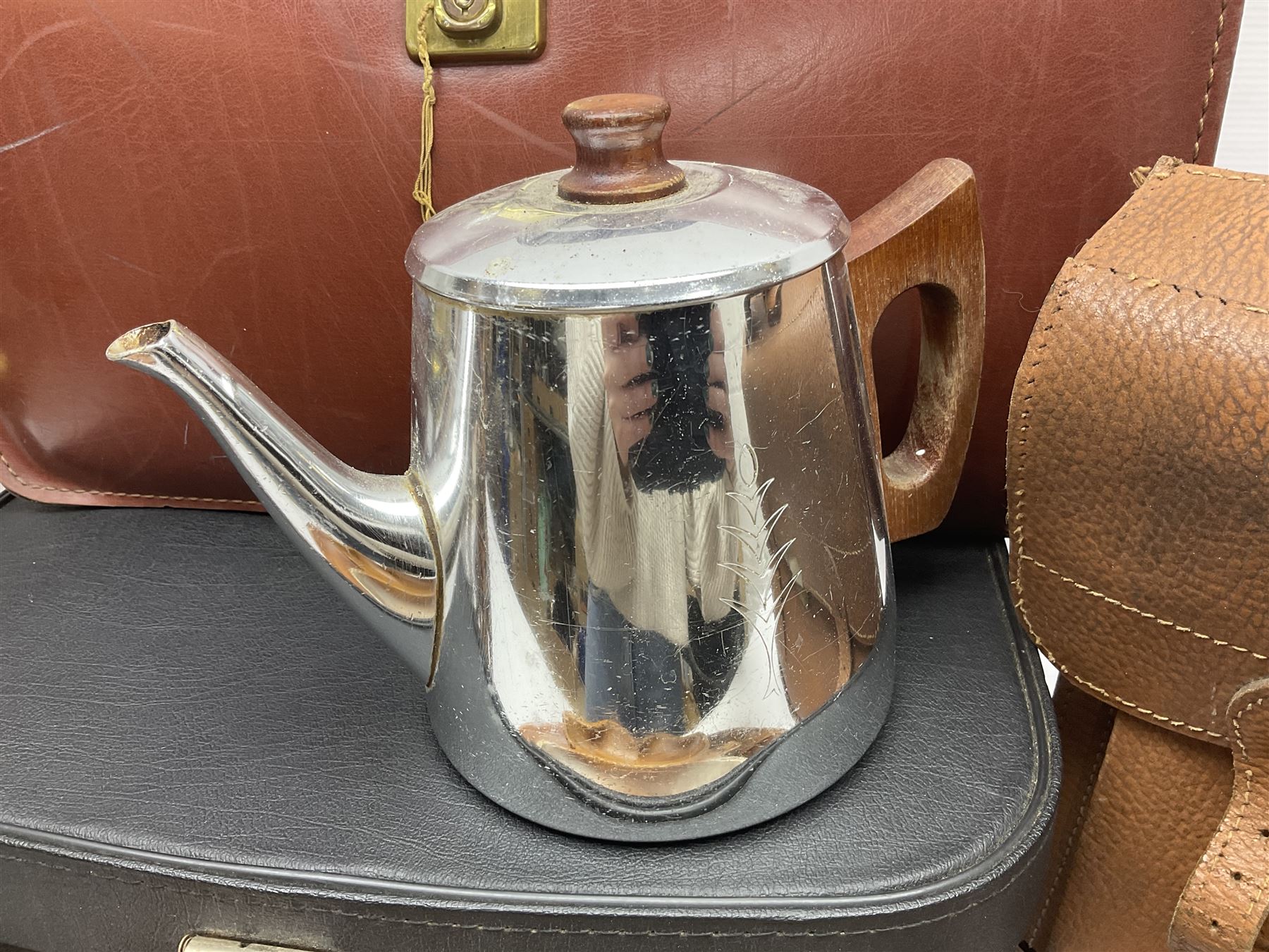 Brass oil lamp, with etched floral glass shade, leather Gladstone style doctors bag, leather satchel and vintage vanity case, three graduating wooden giraffes and other wood and metal ware, lamp H54cm