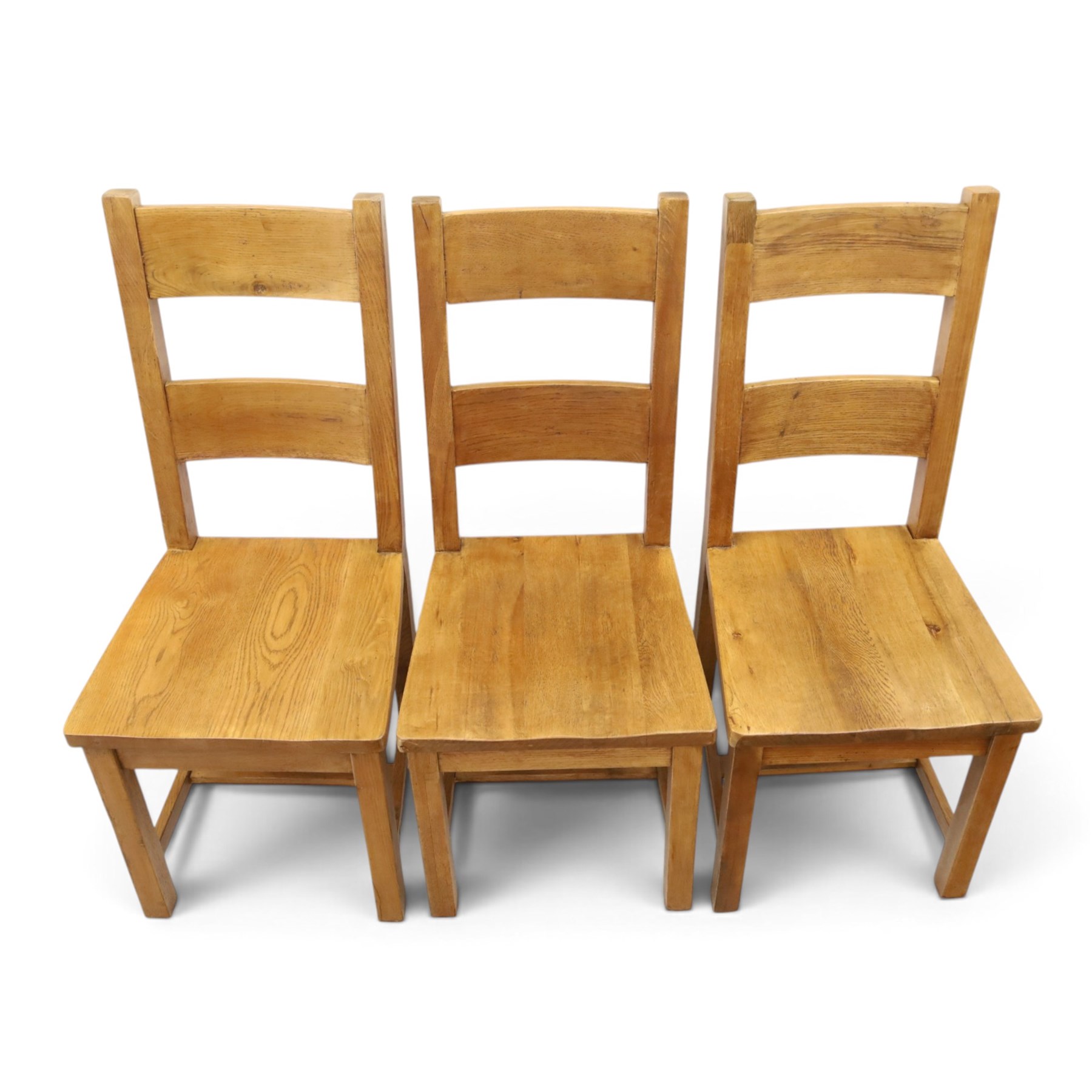 Indigo Furniture - large rustic oak dining table, rectangular four plank top raised on square supports; with set of six beech high ladder-back dining chairs
