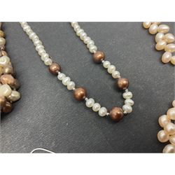Six fresh water pearl necklaces, including a long brown tone example, and two fresh water pearl three row bracelets
