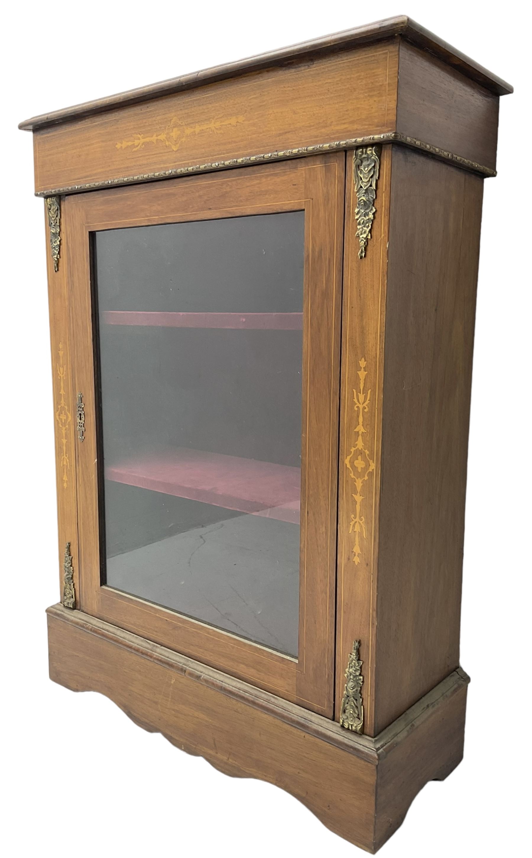 Victorian walnut pier cabinet, moulded rectangular top over inlaid frieze, decorated with gilt metal mounts and beading, the glazed single door flanked by inlaid uprights, on moulded plinth base