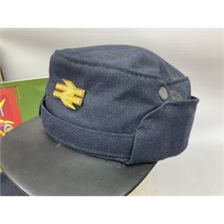 Black painted three colour railway lamp with revolving filters, H29cm; BR Acme Thunderer whistle; three railway peaked caps, two with BR Intercity 125 badge; small album of photographs of railway interest etc