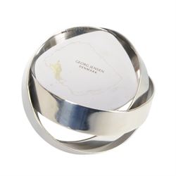 Pair of Georg Jensen stainless steel candleholders and matching pair of tealight holders, both designed by Alken & Bengtsson, with original boxes 