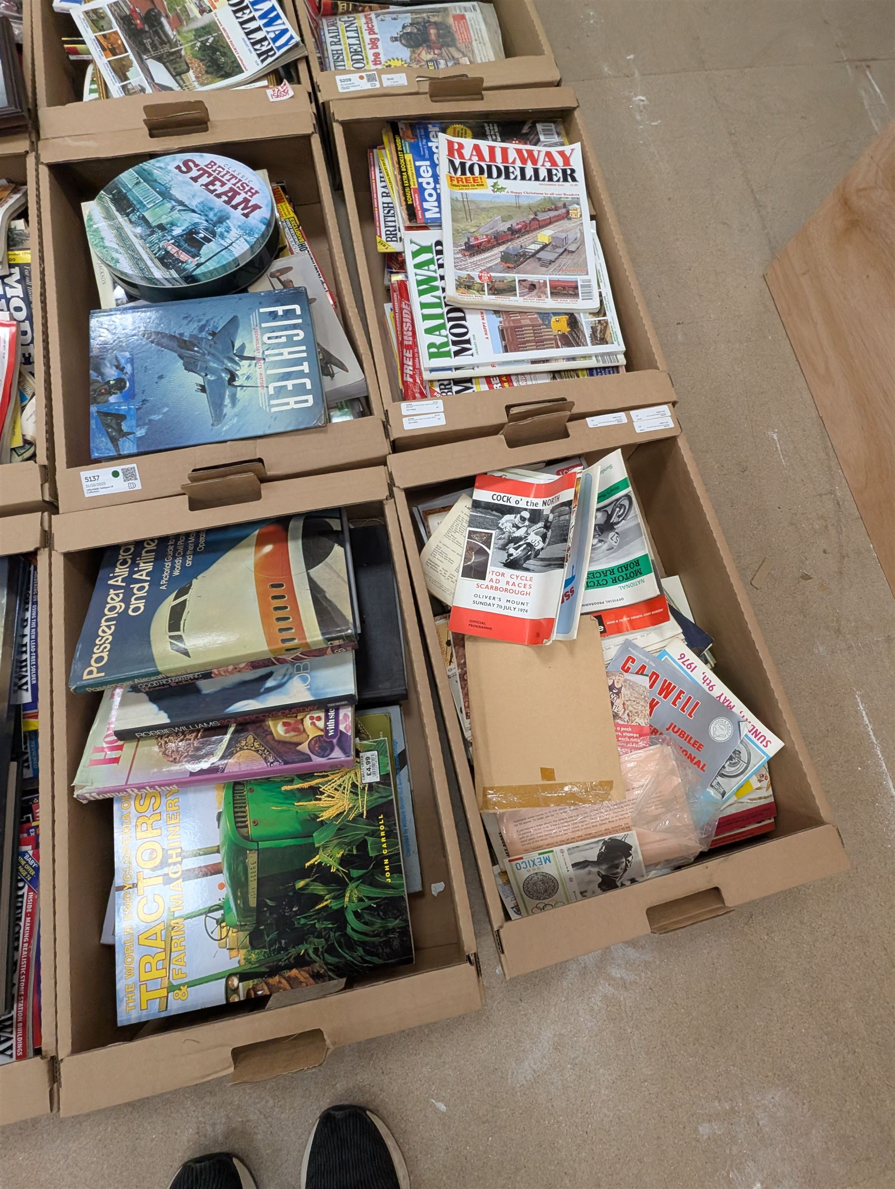 Large collection of model railway magazines, including Railyway Modeller, British Railway Modelling and Model Rail, together with railway and similar reference books, childrens books and VHS tapes in eleven boxes