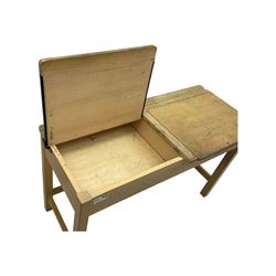 Mid-20th century beechwood school desk, rectangular lift-top desk with storage compartment, supported by square legs with cross stretchers; four matching beech chairs (5)