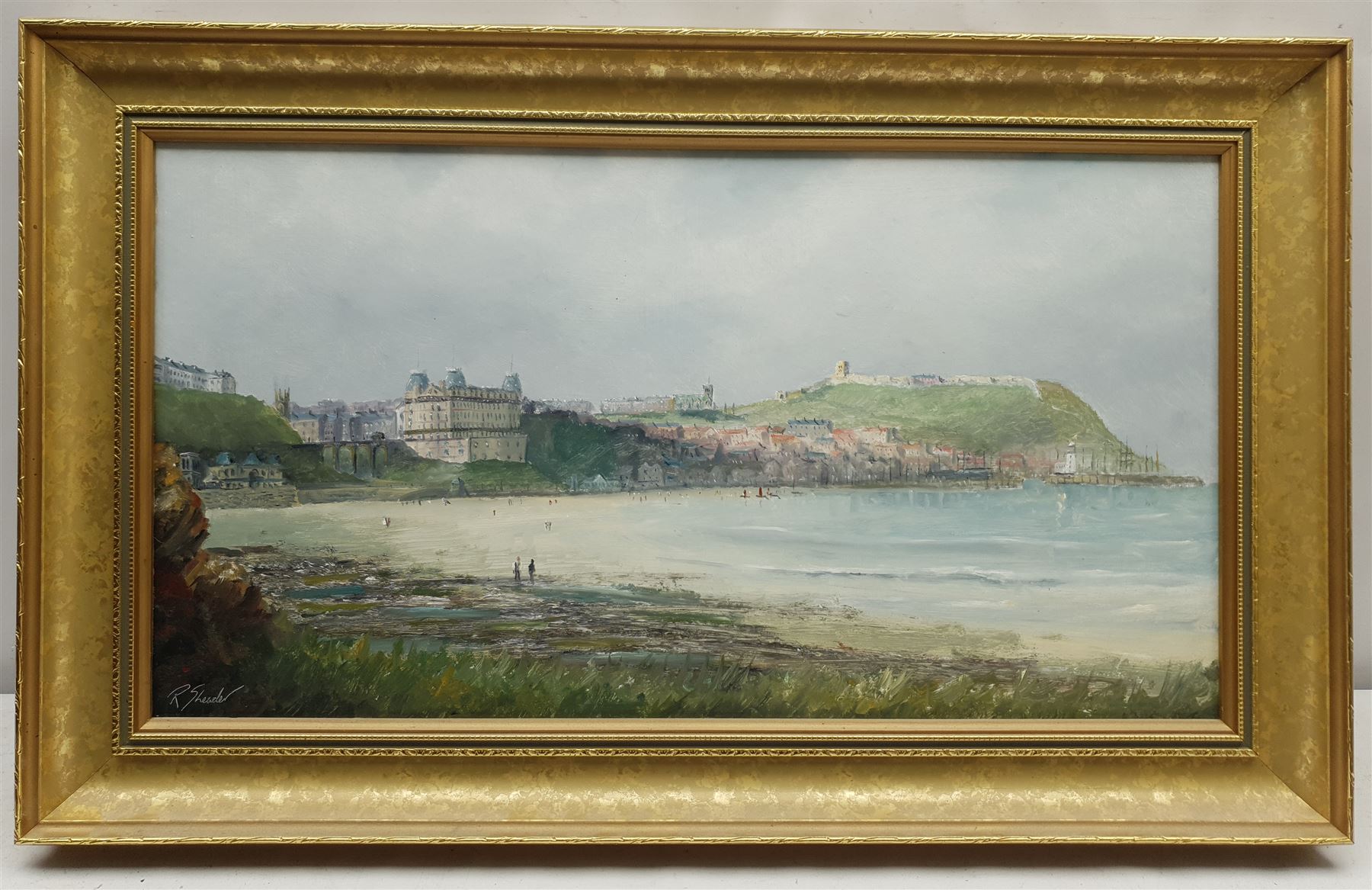 Robert Sheader (British 20th century): Figures on the South Bay Scarborough, oil on board signed 31cm x 59cm