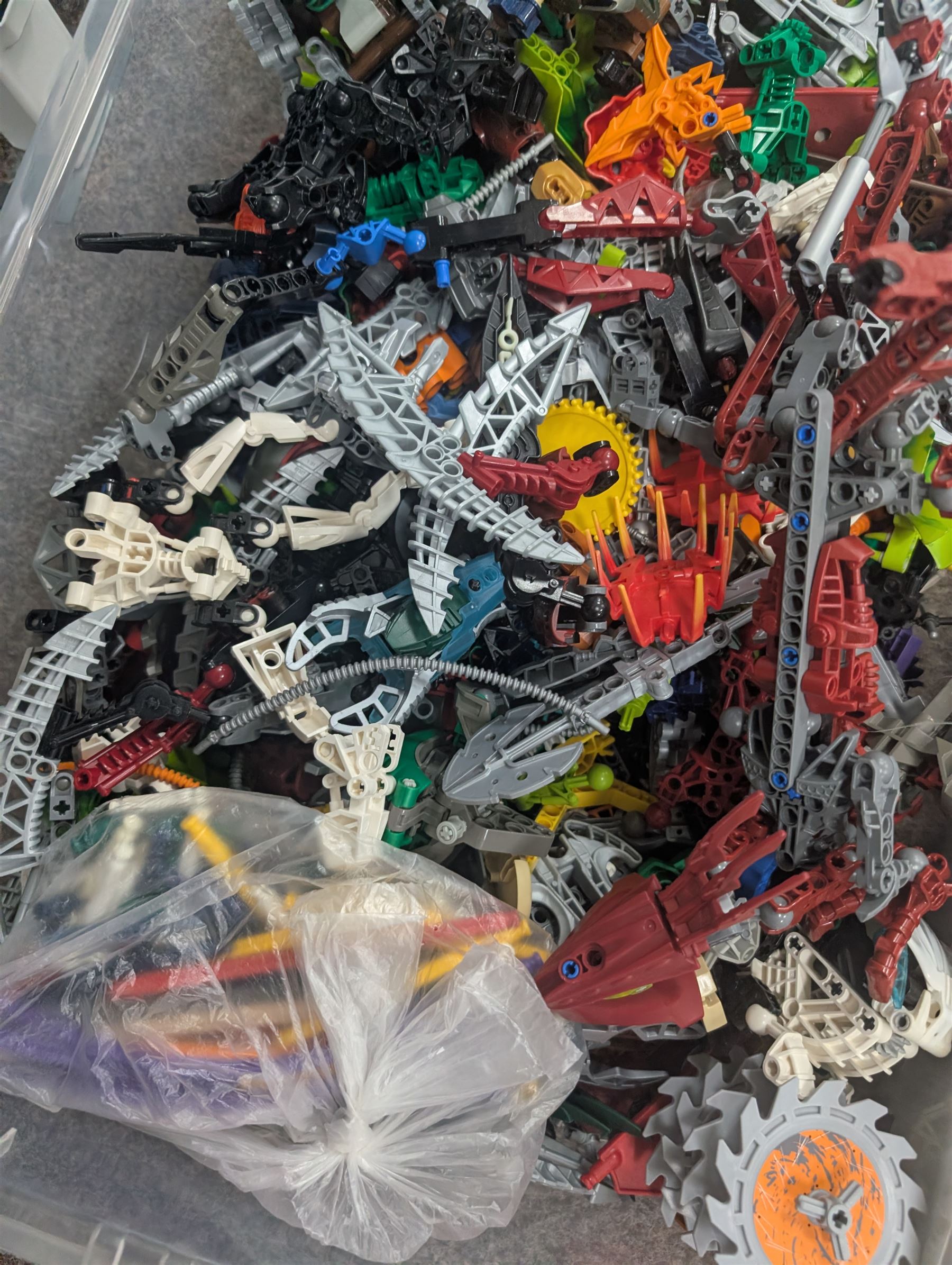 Lego Bionicle and similar part built figures and parts, including boxed sets and loose, together with a Lego Ninjago Build Your Own Adventure set and ten LEDlite Legends of Chima keyrings