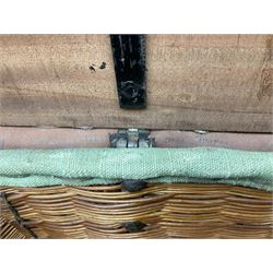 WW2 British Army RAMC 'Regimental Medical Pannier', well marked externally and dated 1941, stamped May 1943 internally, canvas covered wicker form with leather edges, hinged top and fall front with two rope carrying handles, fitted iron locking straps with securing chains; contains various unused field dressings and bandages with WW2 dates and two pillows; original label under lid L79cm