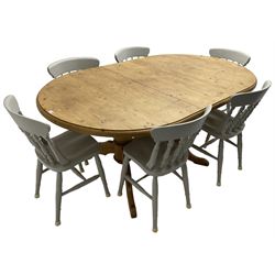 20th century pine extending dining table, oval top over twin bulbous turned pedestal base united by stretcher, with additional leaf (W160cm D120cm H79cm); and set of seven ash painted dining chairs, spindle back, raised on ring turned supports joined by H-stretcher
