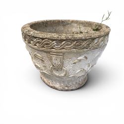 Five composition stone garden planters, comprising various circular and square forms with relief foliate decoration, together with a cylindrical lidded garden pot.