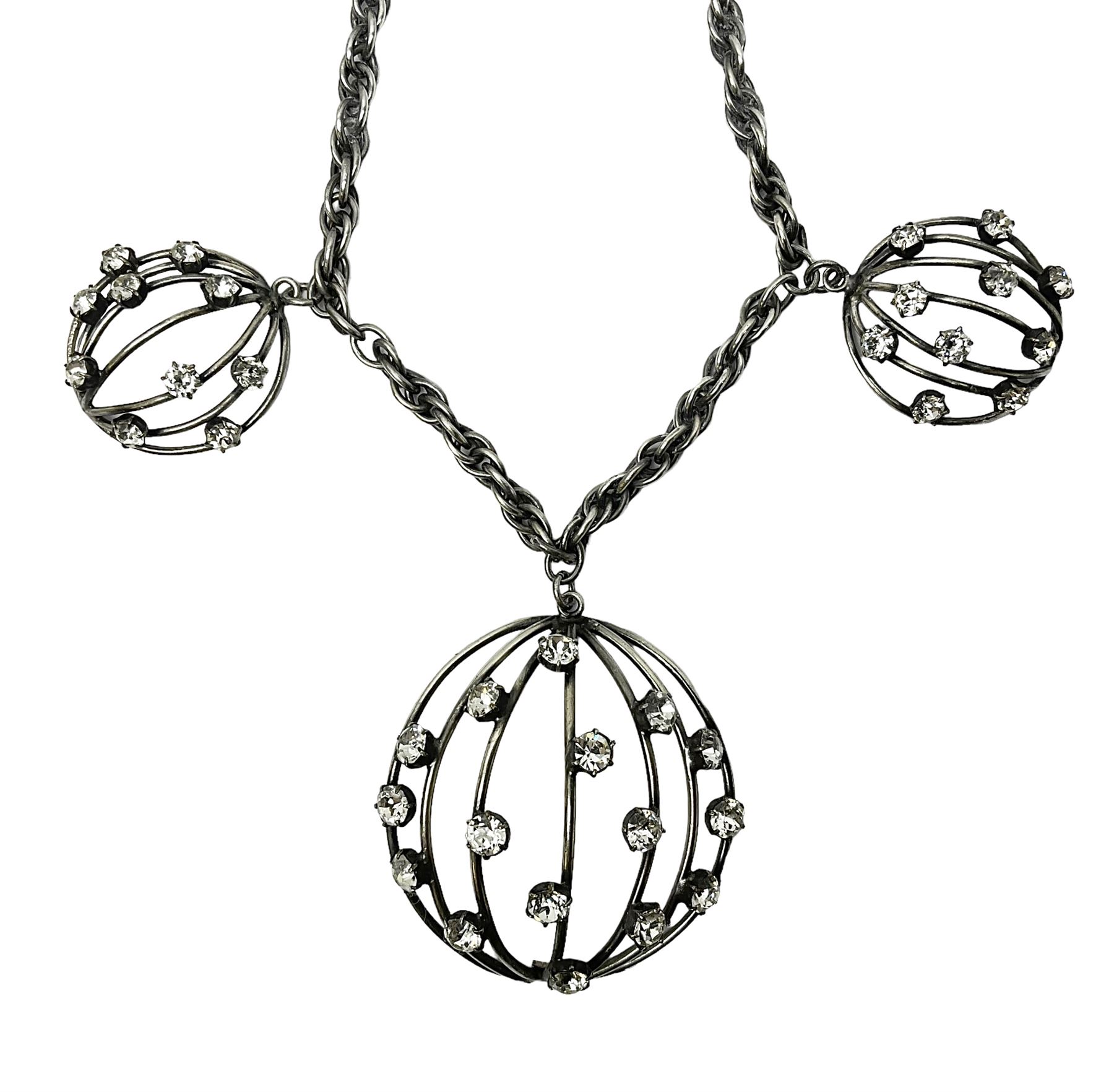 Joseff of Hollywood, circa 1950s metal and white paste necklace, with three graduated pendant drops set with white paste, to a Prince of Wales chain, signed with round script tag