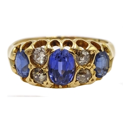  18ct gold three stone oval sapphire and four old cut diamond ring  
[image code: 4mc]