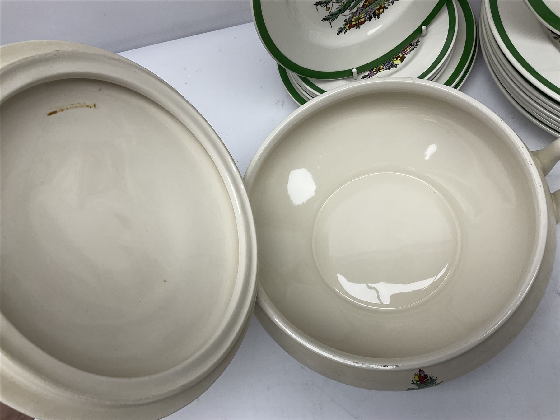 Collection of Spode Christmas Tree pattern part dinner service, comprising three covered tureens, eight dinner plates, eight side plates, eight dessert plates, sauce boat and saucer and serving platter (30)