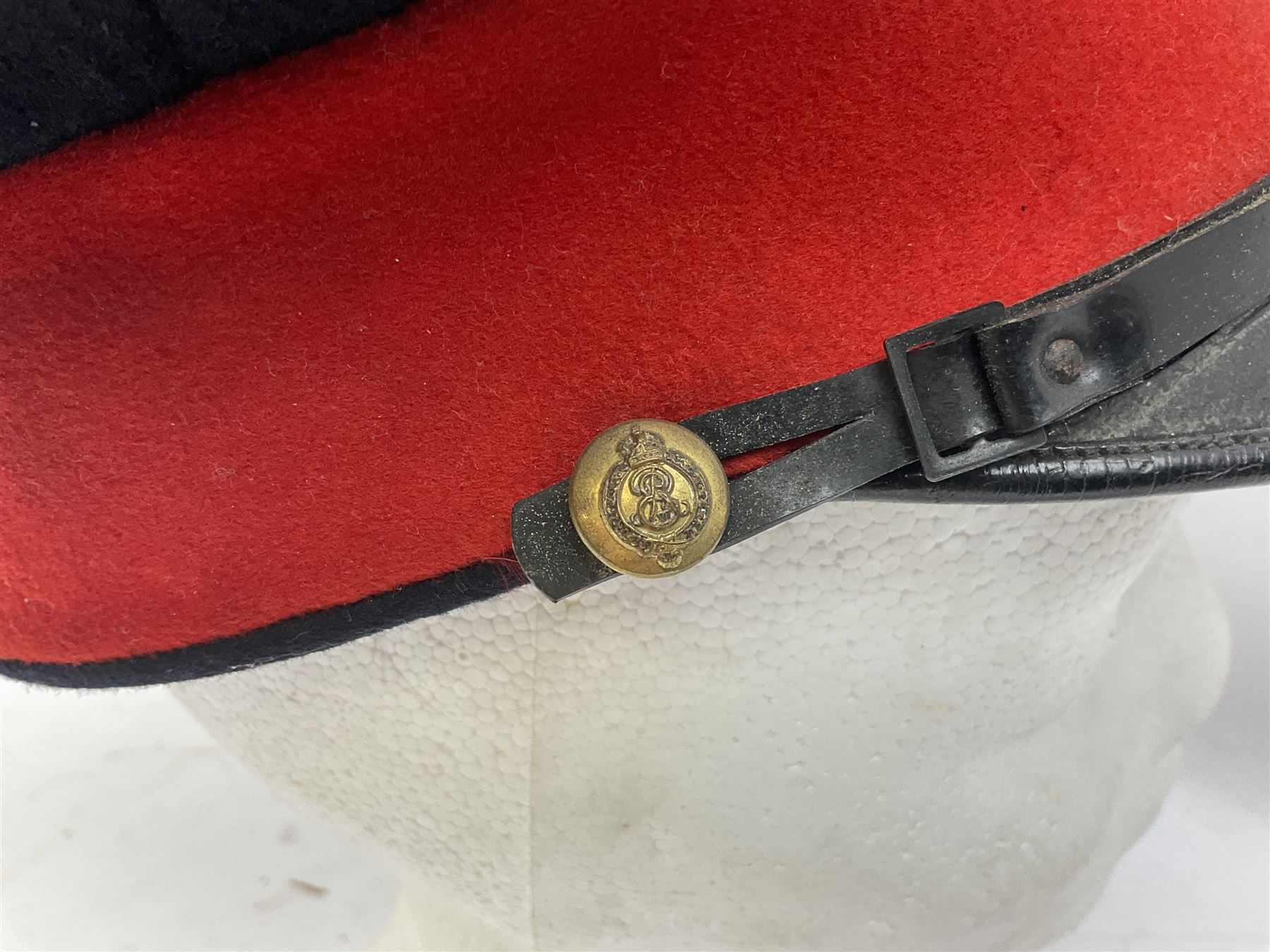 Royal Military College Sandhurst parade uniform with peaked cap and two-piece mess dress, all bearing historic manuscript labels for J.E.A. Baldwin, possibly Air Marshal Sir John Eustace Arthur Baldwin (1892-1975) who served in the British Army 1910-18 & 1944-58 and in the RAF 1918-44.