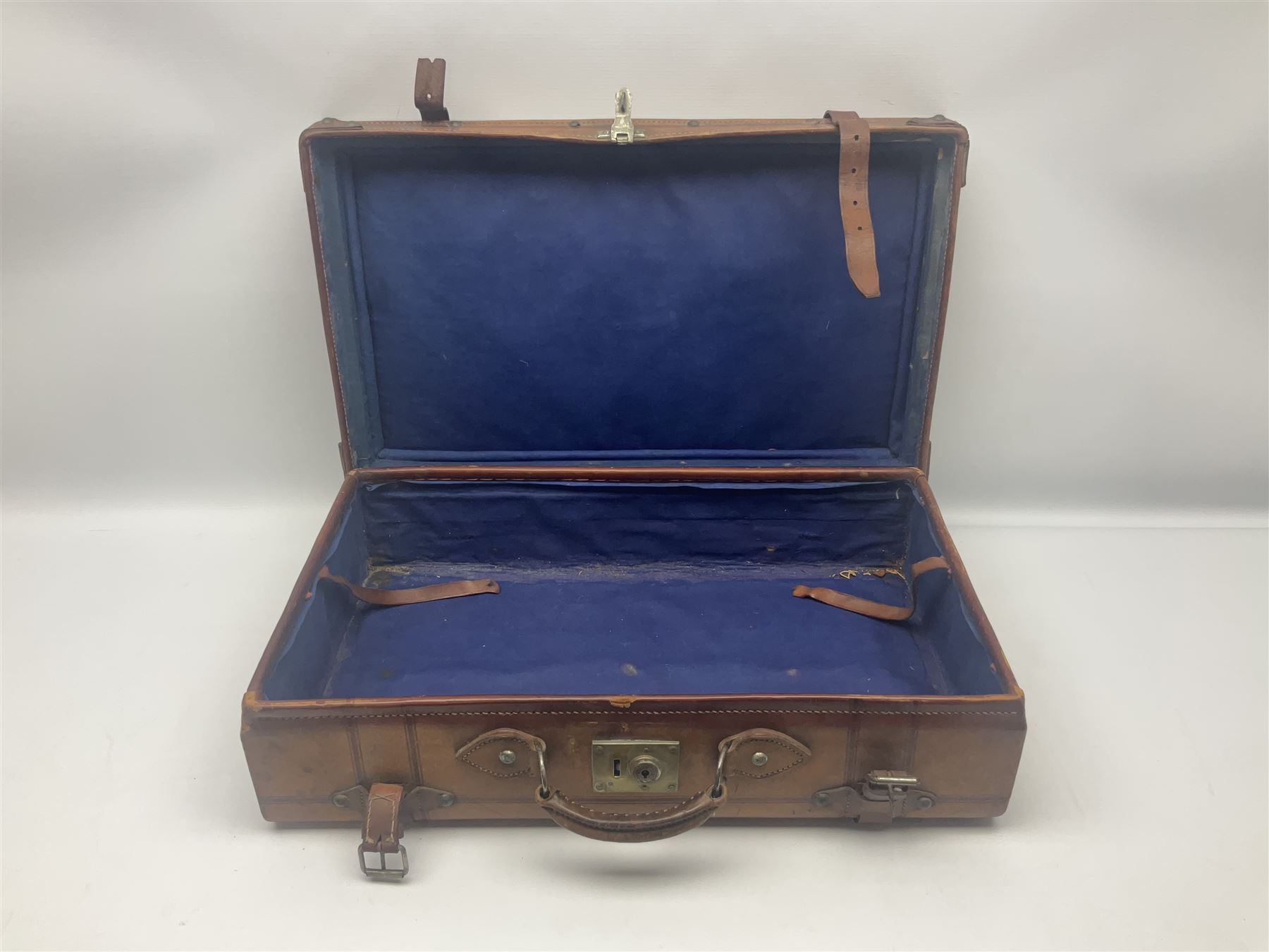 Late 19th/early 20th century stitched and studded leather portmanteau type suitcase with expanding lid and straps, L61cm