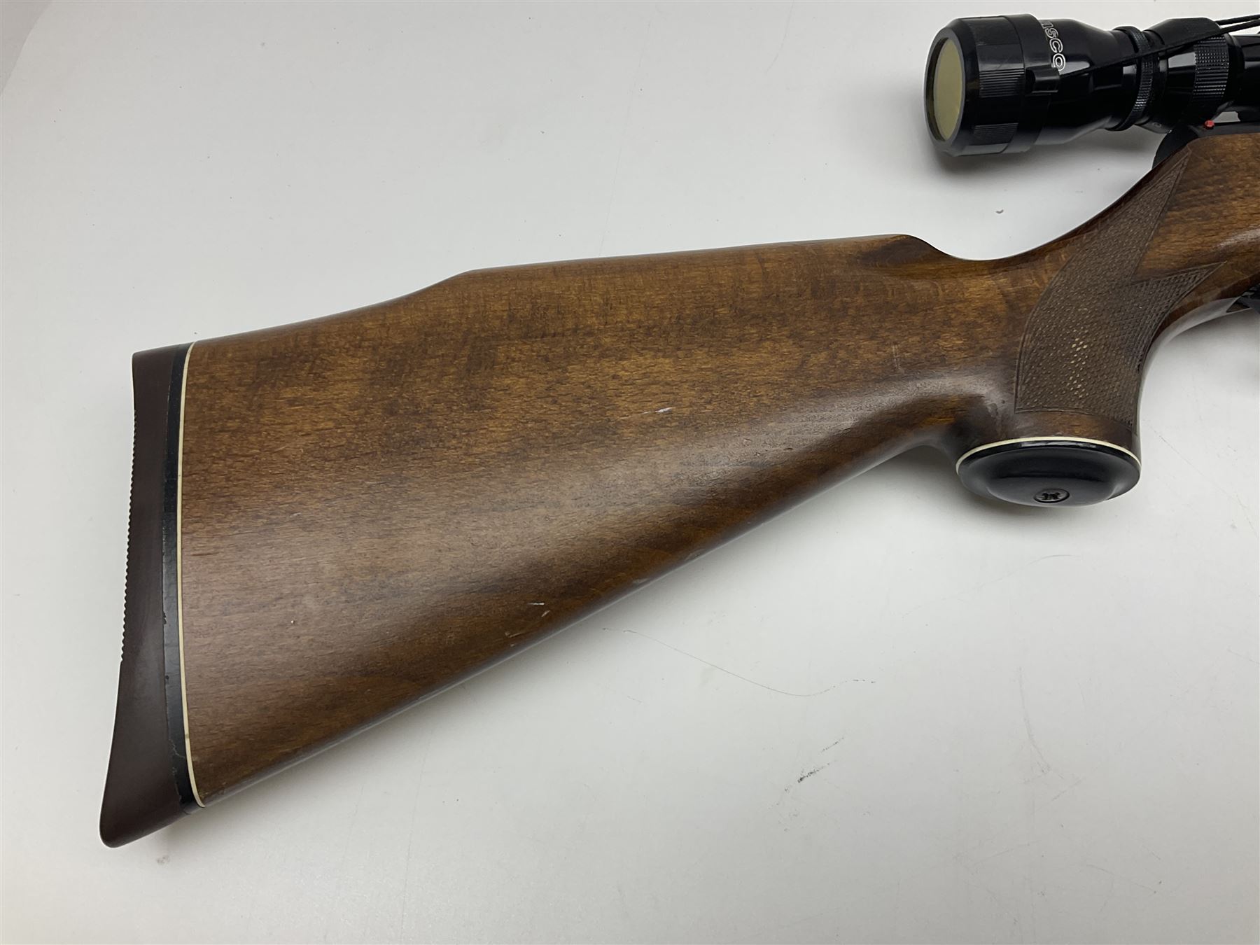 Weihrauch model HW 77 K  .22 air rifle with under lever action, beech stock with chequered pistol grip and Tasco WA39x40-1 scope, serial no.1283661 L102cm overall NB: AGE RESTRICTIONS APPLY TO THE PURCHASE OF THIS LOT