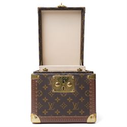 Late-20th century Louis Vuitton monogram Boîte Flacons vanity coffret, monogram canvas with lozine trim and brass mounts, single front brass lock stamped Louis Vuitton with key code 1247413, the interior fitted with leather flacon retaining loops and lift-out lidded tray with leather handle, label to interior printed Louis Vuitton Paris serial number 1045768, together with two keys stamped with matching serial numbers to the lock and luggage tag, circa late 1990s-early 2000s
