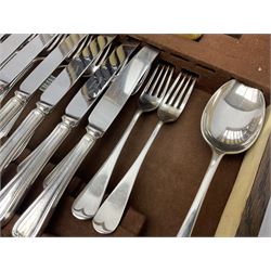Twelve place setting canteen of cutlery by Lee & Wigfull Ltd, cased in an oak  chest, with key, meat carvers are missing, H18cm, L44cm 