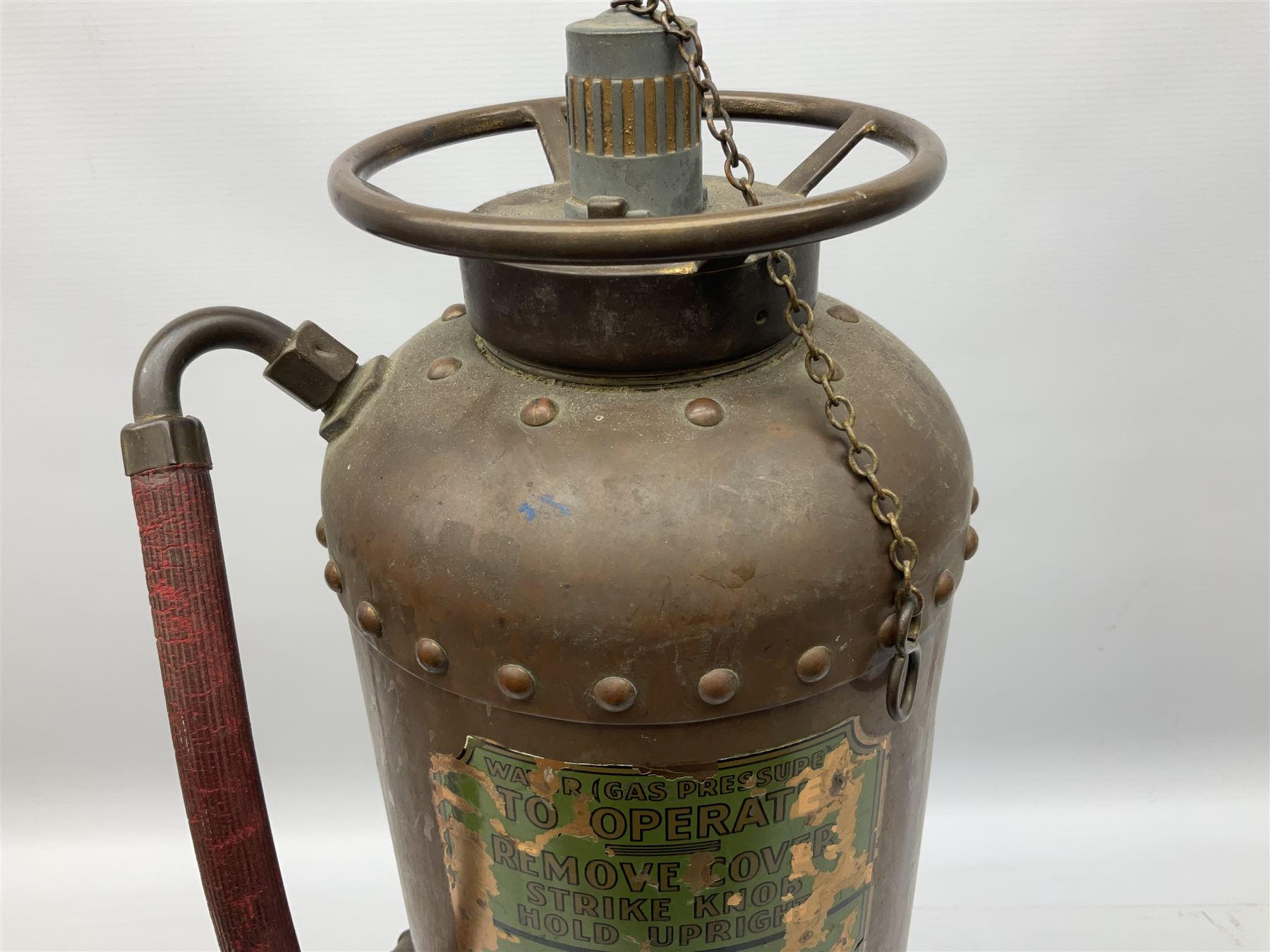 Large copper ‘Waterloo’ fire extinguisher by Read and Campbell Ltd and another Safex example 
