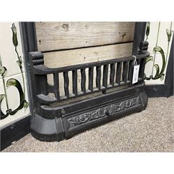 The Gallery Collection Fireplaces - 'Edwardian' cast iron fireplace, the hood decorated with interlacing floral design, with Art Nouveau inspired upright tiles