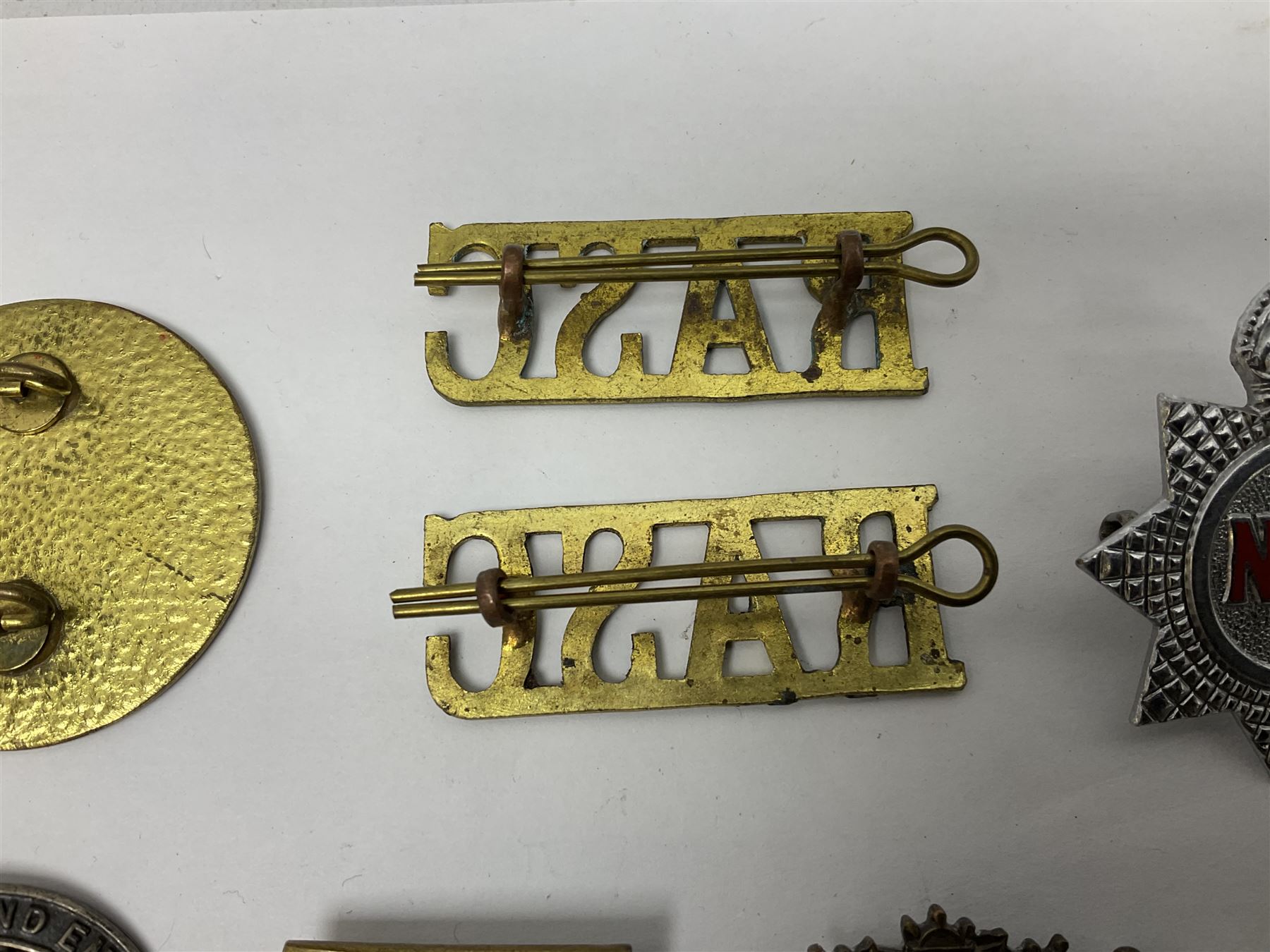 Two Services Rendered badges Nos.B23060 and B201341; two MSO BAOR (Mixed Services Organisation British Army of the Rhine) badges; small quantity of shoulder titles, lapel/sweetheart brooches, buttons and non-military related items