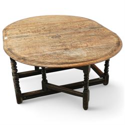 Late 17th century oak drop-leaf dining table, oval drop-leaf top on gate-leg action base, bobbin turned supports untied by moulded stretchers 