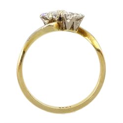 18ct gold two stone round brilliant cut diamond crossover ring, stamped, total diamond weight approx 0.75 carat