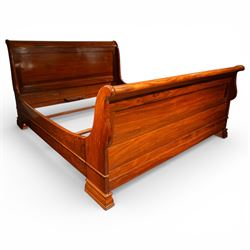Victorian style mahogany super king sleigh bed with bases, shaped panelled headboard and footboard with scrolled ends, moulded side rails, raised on block supports with castors
