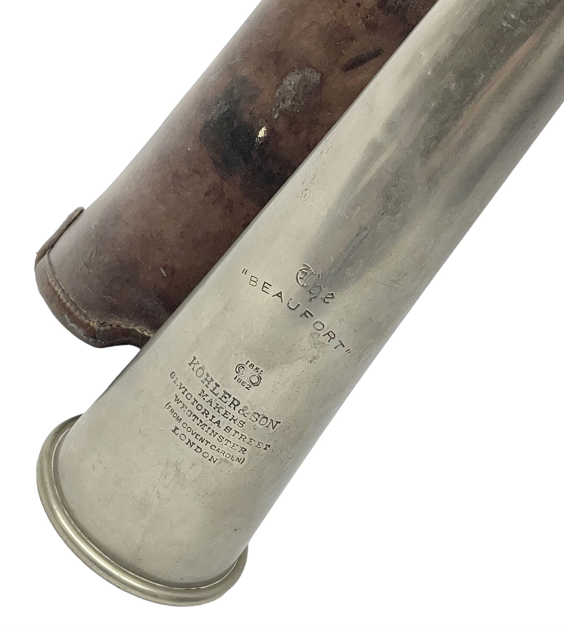 19th century telescopic hunting horn, the bell engraved 'The Beaufort', with makers mark Kohler & Son, makers, 61 Victoria Street, Westminster (from Covent garden) London, in a leather sheath, horn full extended L91cm 