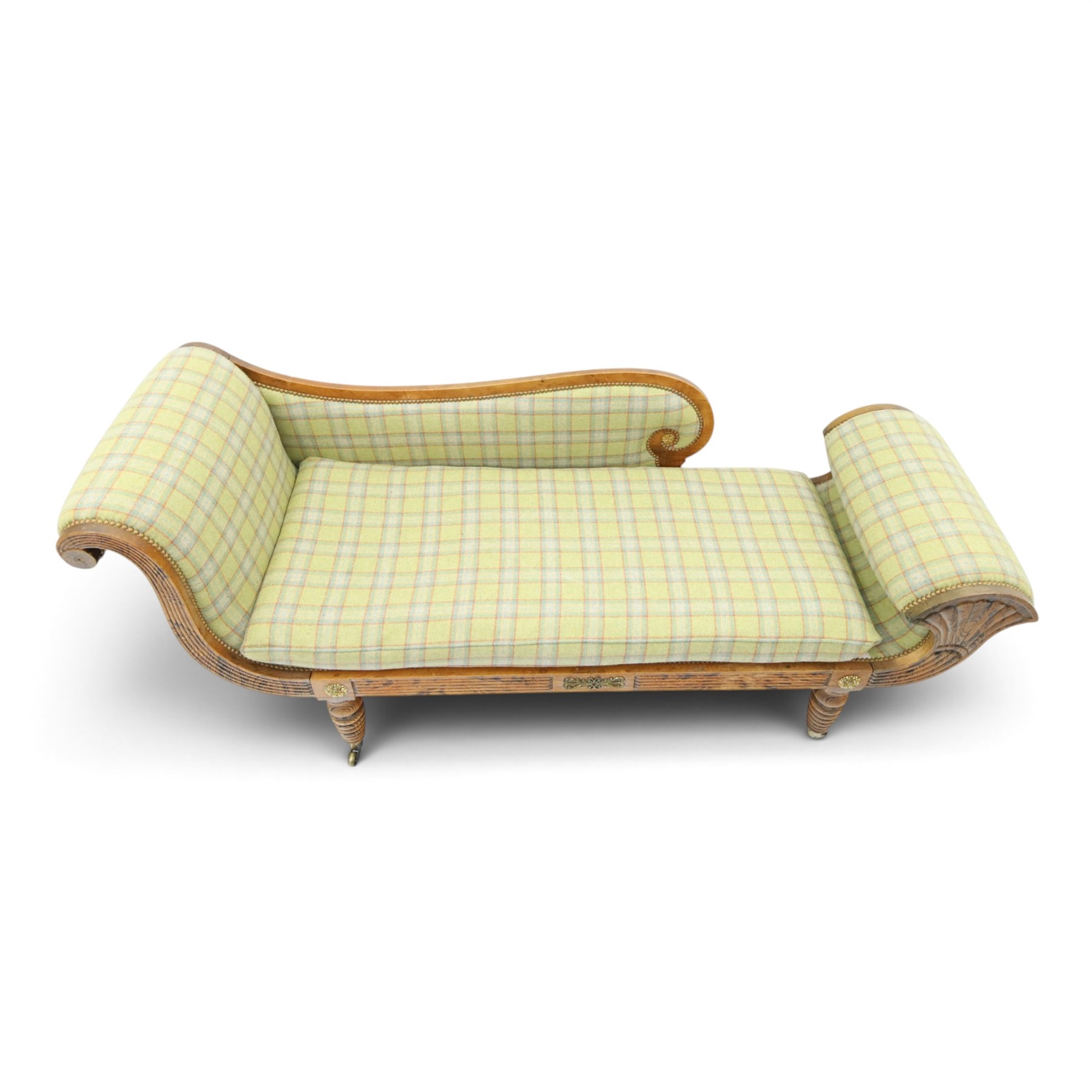  19th century scumbled oak chaise longue upholstered in tartan fabric, swept frame with gilt mounts, studded border with loose base cushion, raised on turned bobbin supports terminating brass castors