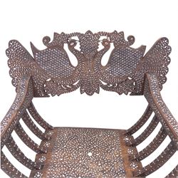 Anglo-Indian bone inlaid hardwood Savonarola chair, the pierced back finely carved with opposing peacocks amongst scrolling foliage, the seat, arms, and X-frame supports. This item has been registered for sale under section 10 of the APHA Ivory Act Reference QWLLGKZM