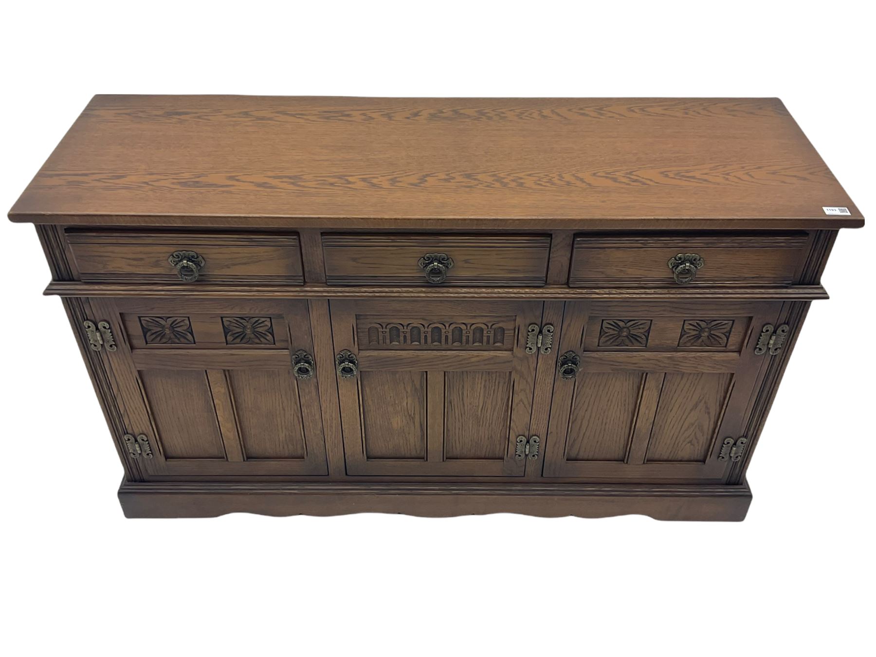 Old Charm Tudor style oak three drawer sideboard