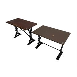 Two pub or bistro tables, rectangular moulded tops on ornate cast iron supports, (107cm x 60cm, H74cm & 91cm x 61cm, H71cm)