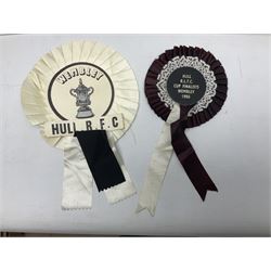 Hull F.C. memorabilia; Clive Sullivan 1986 memorial game programme, Open Evening 1994 programme with multiple player signatures, 'Old Faithful' 45rpm record, Wembley rosettes, 2000 team poster with facsimile signatures, framed print 'Farewell to the Boulevard 1895-2002', fully signed team photograph, various booklets, CD, DVD etc; and a folder containing the Merlin Rugby League card collection