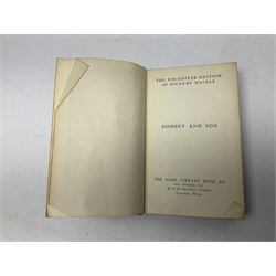 Twenty one volumes of Charles Dickens,  by The Home Library Book company, together with The Readers Digest bedside book of the art of living 